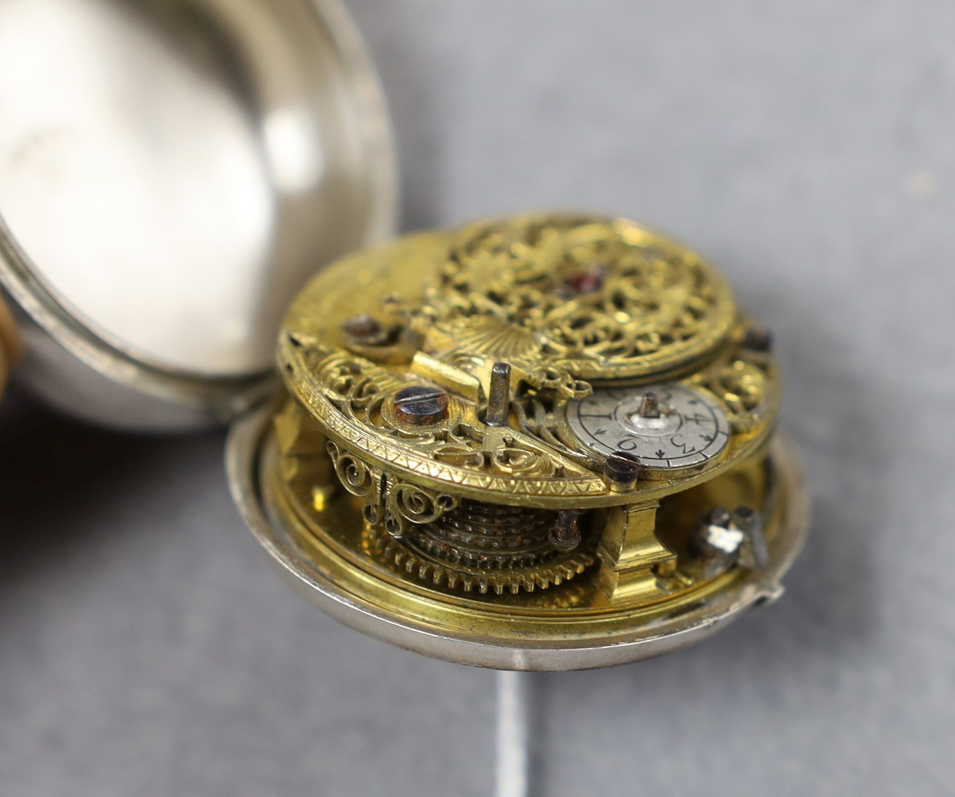 An 18th century white metal pair cased keywind verge pocket watch, by Isaac Soret, cased diameter 51mm